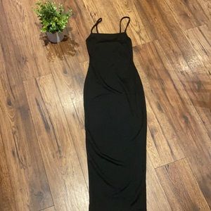 Long black maxi dress you can dress up and down .